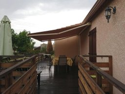 2019 Store banne - pose d'une toile de protection solaire pour store à banne Somfy articulé sur terrasse 1 (img_FB)